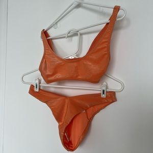 Orange ribbed teeny bikini